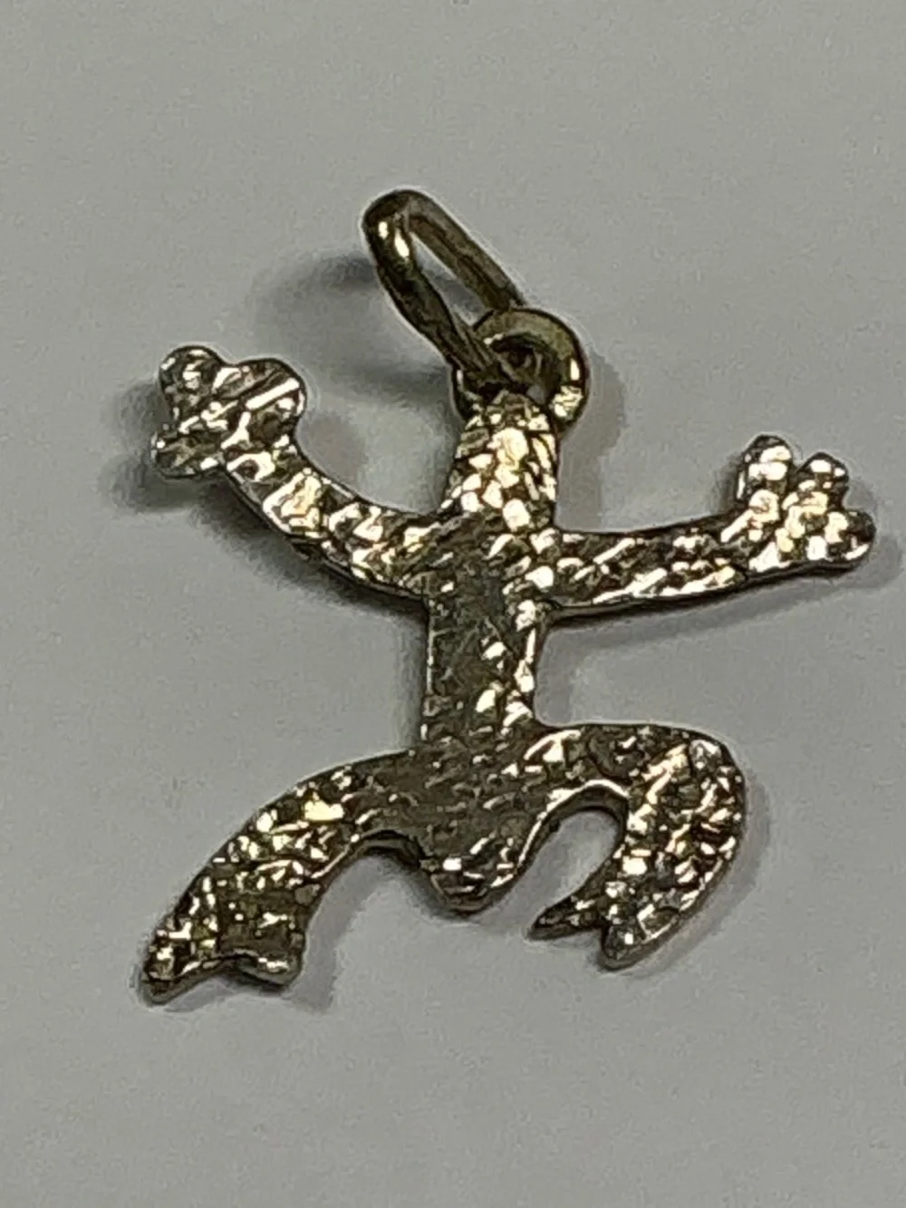 99 Fine Silver Taino Coqui Pendant. 3/4 inch by 3/4 inch